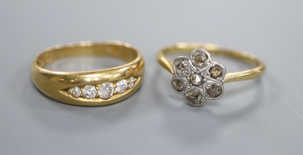 Two early 20th century 18ct and diamond rings